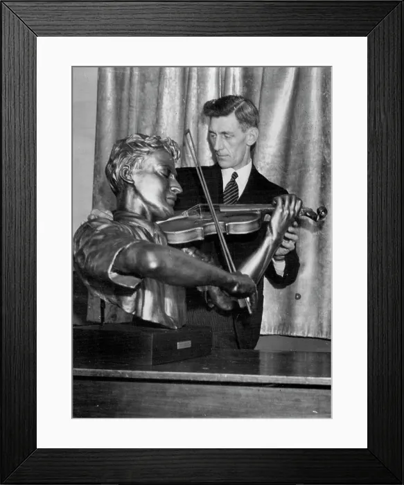 Framed Print : Bricklayer - Cum - Sculptor, makes bust for Yehudi Menuhin with fin still as guide