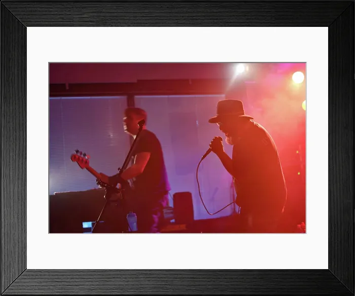 Framed Print : A band plays during an Independence Day celebration with U