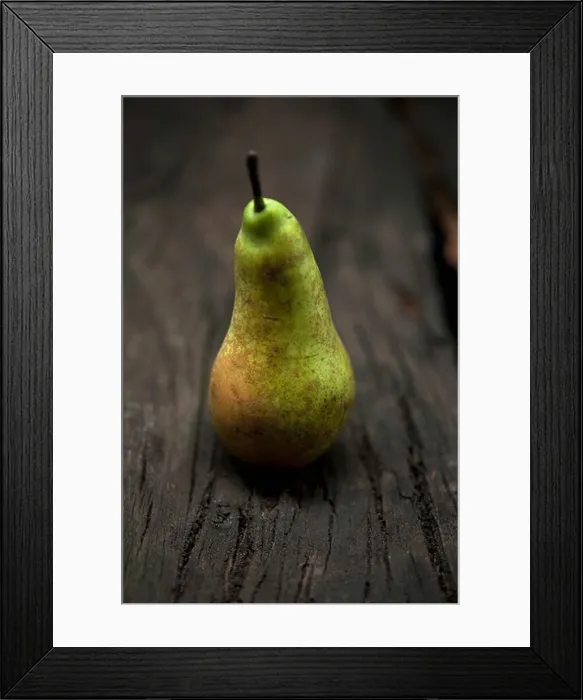 Framed Print : Close up of pear on table