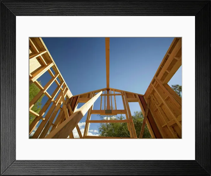 Framed Print : Beam of a home under construction during framing process in Southern California Framed Print : Beam of a home under construction during framing process in Southern California