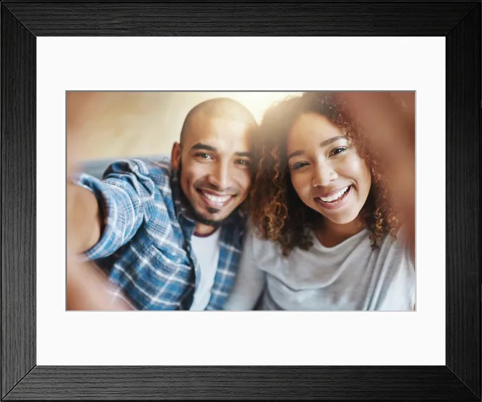 Framed Print : Smiling couple taking selfies as home owners Framed Print : Smiling couple taking selfies as home owners