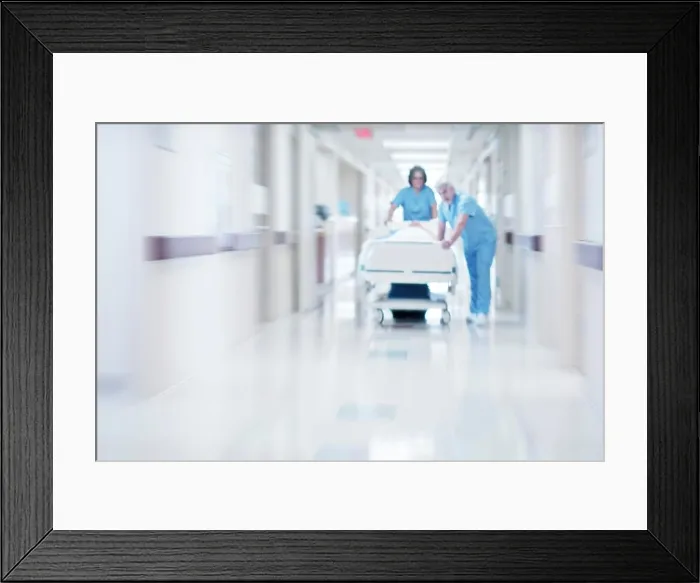 Framed Print : Two doctors pushing hospital bed Framed Print : Two doctors pushing hospital bed