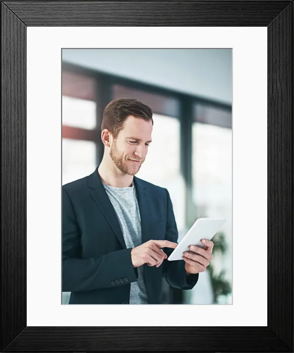 Framed Print : Businessman, tablet and online research or internet for real estate website or property management Framed Print : Businessman, tablet and online research or internet for real estate website or property management