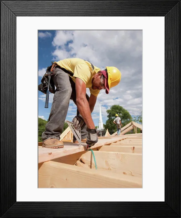 Framed Print : Carpenter marking spacing of rafters with carpenter triangle Framed Print : Carpenter marking spacing of rafters with carpenter triangle