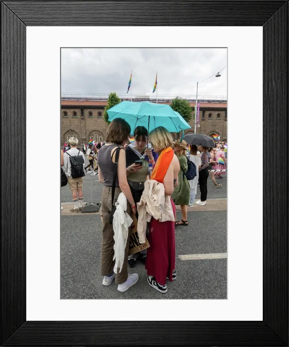 Framed Print : Stockholm, Sweden Three girls under an umbrella at the Stockholm Pride March 2024 Framed Print : Stockholm, Sweden Three girls under an umbrella at the Stockholm Pride March 2024