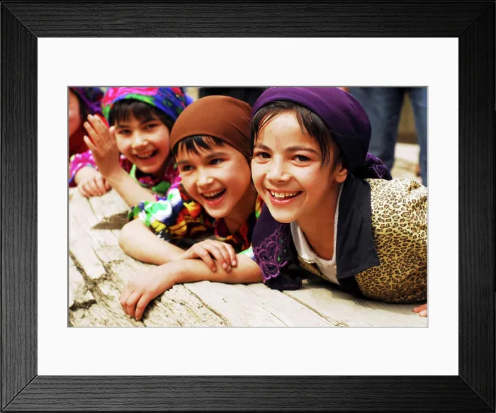 Framed Print : Tajikistan, Penjakent, group of local girls in traditional dress posing and playing by the river on wooden bridge Framed Print : Tajikistan, Penjakent, group of local girls in traditional dress posing and playing by the river on wooden bridge