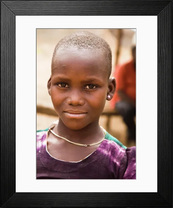 Framed Print : Africa, West Africa, Ghana, Yendi. Close-up shot of young Dagomba girl Framed Print : Africa, West Africa, Ghana, Yendi. Close-up shot of young Dagomba girl