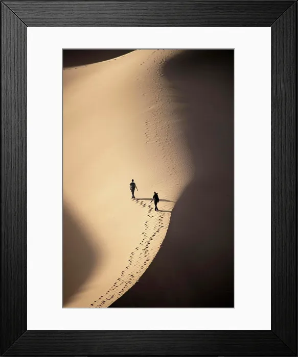 Framed Print : Tourists leaving footprints while walking on sand dune in Sahara Desert