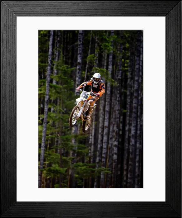 Framed Print : Motocross rider getting big air off of large double jump in motocross Race in Campbell River Framed Print : Motocross rider getting big air off of large double jump in motocross Race in Campbell River