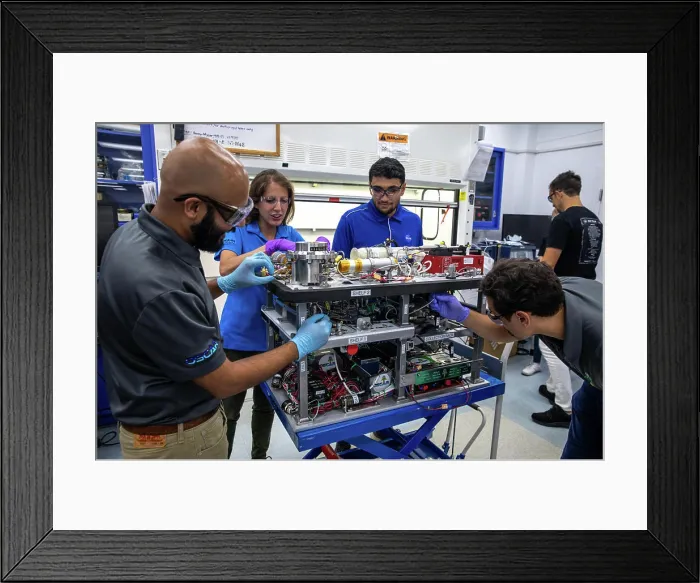 Framed Print : The Trash to Gas team members prepare flight hardware for NASAs Orbital Syngas Commodity Augmentation Reactor Framed Print : The Trash to Gas team members prepare flight hardware for NASAs Orbital Syngas Commodity Augmentation Reactor
