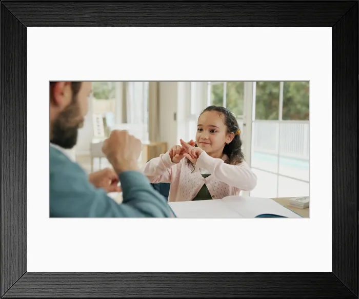 Framed Print : Dad, kid and learning sign language in home for development