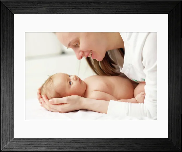 Framed Print : One month old newborn baby with mother One month old newborn baby with his mother Framed Print : One month old newborn baby with mother One month old newborn baby with his mother