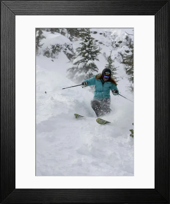 Framed Print : A skier descends a snowy slope through deep powder on a beautiful day in Kirkwood, California Framed Print : A skier descends a snowy slope through deep powder on a beautiful day in Kirkwood, California