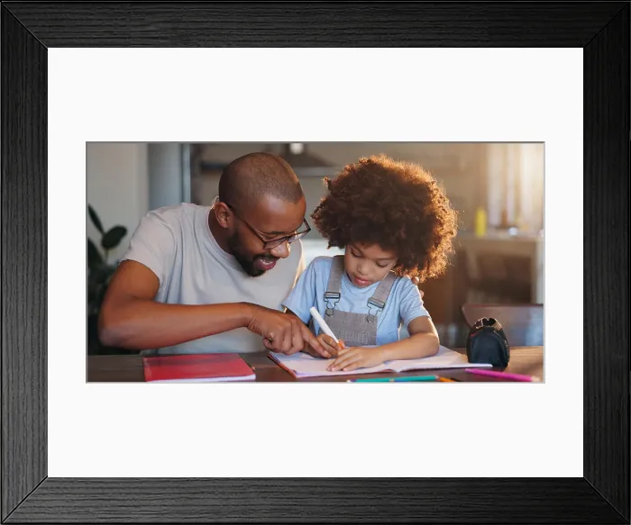 Framed Print : Father, boy and notebook for writing Framed Print : Father, boy and notebook for writing