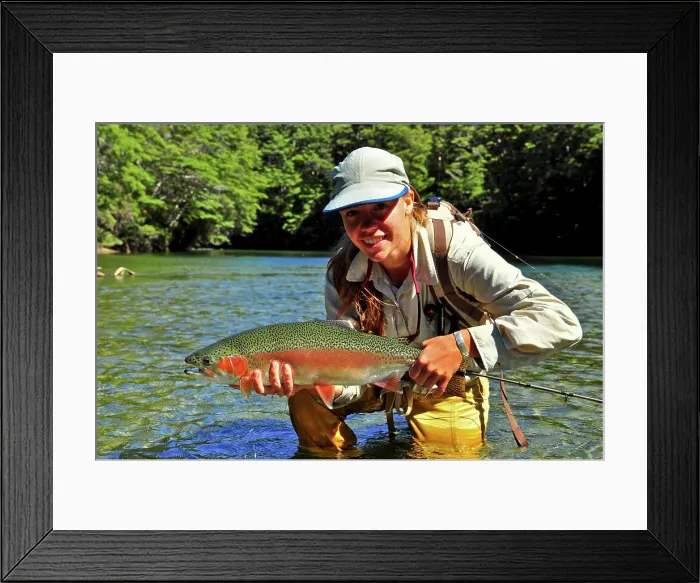 Framed Print : Woman holding rainbow trout, New Zealand Framed Print : Woman holding rainbow trout, New Zealand