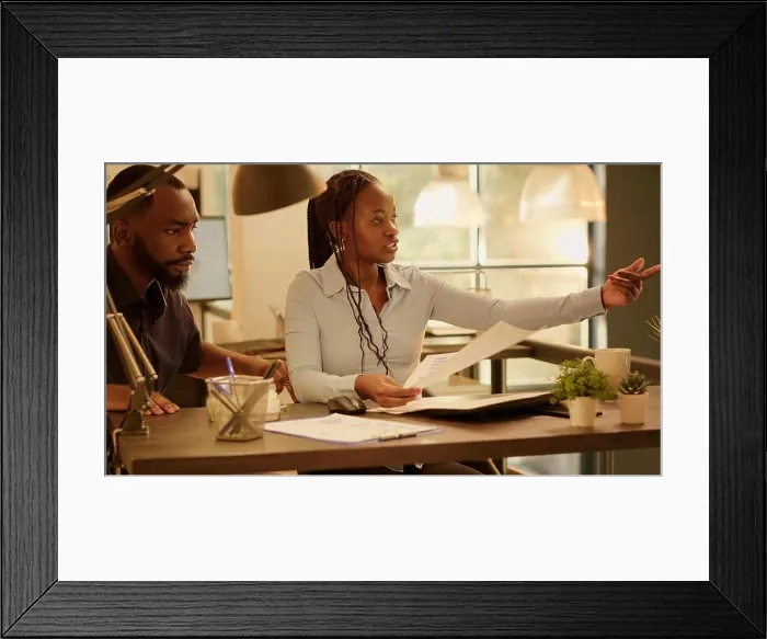 Framed Print : Business team of people brainstorming ideas to create report Framed Print : Business team of people brainstorming ideas to create report
