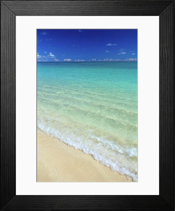 Framed Print : Shoreline water breaking onto shore, turquoise ocean clouds along horizon C1725