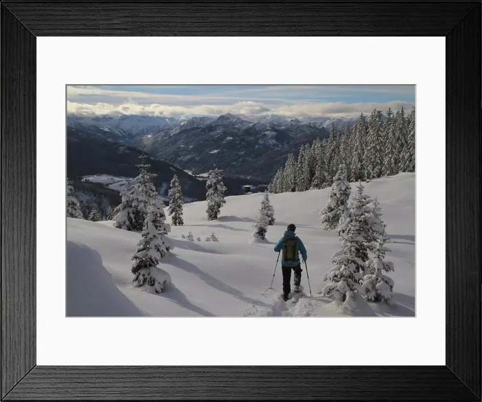 Framed Print : Rear view of man hiking on snow covered mountain Framed Print : Rear view of man hiking on snow covered mountain