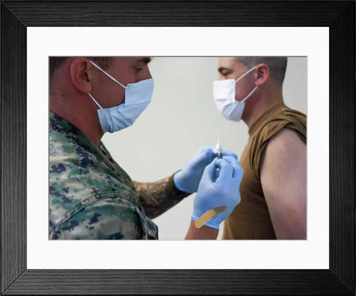 Framed Print : Setting the example for staff, the Commander and Director of Naval Medical Center Camp Lejeune