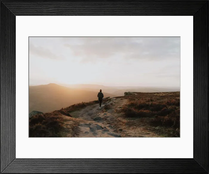 Framed Print : Silhouetted woman watching sunset from tranquil cliff, Bamford Edge, Derbyshire, England