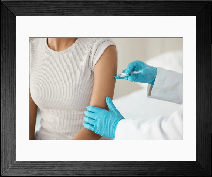Framed Print : Hands, doctor and needle with patient at clinic for vaccine injection