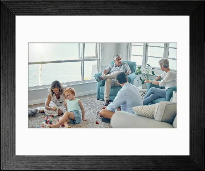 Framed Print : Family, generations and love together in living room with parents