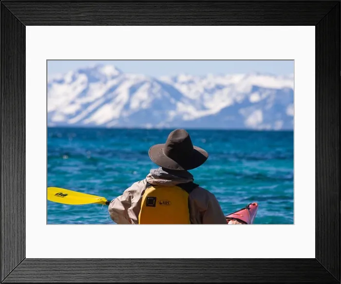 Framed Print : A man sea kayaking on Lake Tahoe near Incline Village in Nevada Framed Print : A man sea kayaking on Lake Tahoe near Incline Village in Nevada