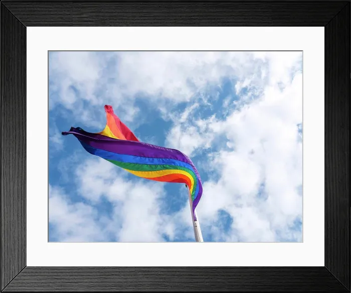 Framed Print : The gay pride flag is blowing in the wind