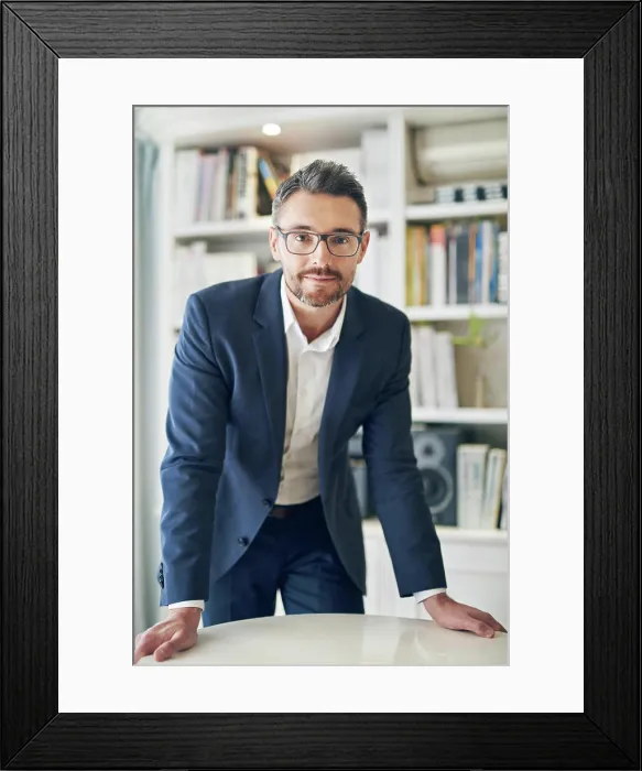 Framed Print : Portrait, serious and business man on desk in office for career or job in Canada