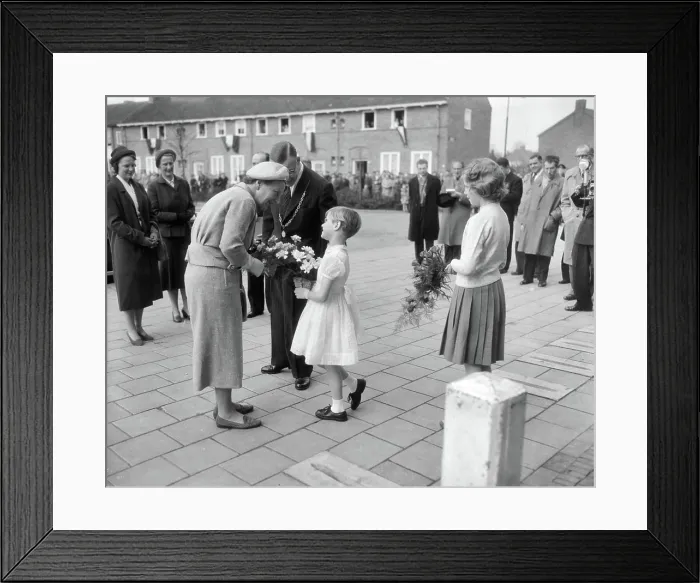 Framed Print : Anefo photo collection. Annemieke Arnouds, 7 years, offers flowers to Queen Juliana. March 29, 1958 Framed Print : Anefo photo collection. Annemieke Arnouds, 7 years, offers flowers to Queen Juliana. March 29, 1958