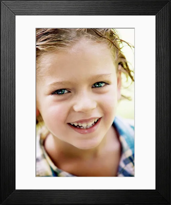 Framed Print : Portrait of a young smiling boy Framed Print : Portrait of a young smiling boy