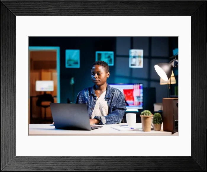 Framed Print : Female student typing on digital laptop Framed Print : Female student typing on digital laptop