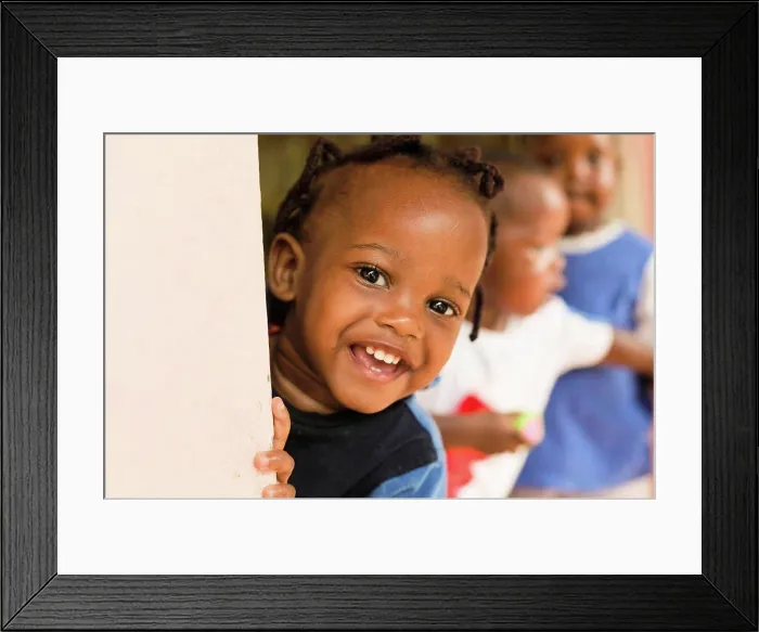 Framed Print : Portrait Of Smiling Child At Sanyu Babies Home, Kampala Uganda Africa