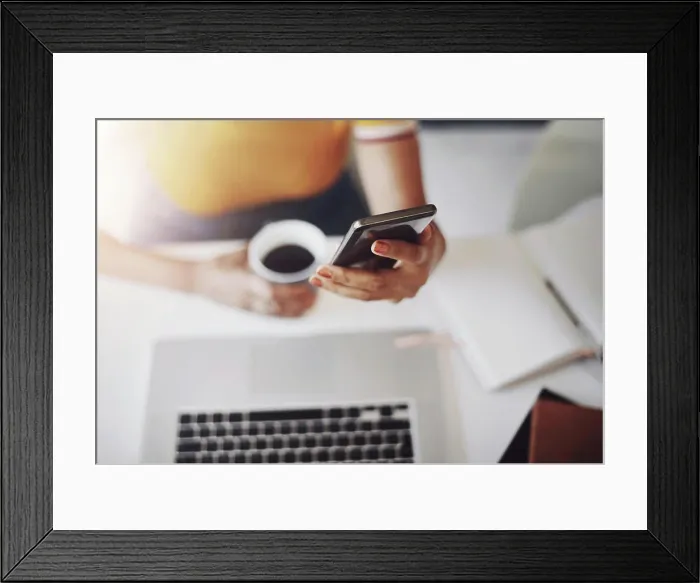 Framed Print : Hands, searching on smartphone with laptop