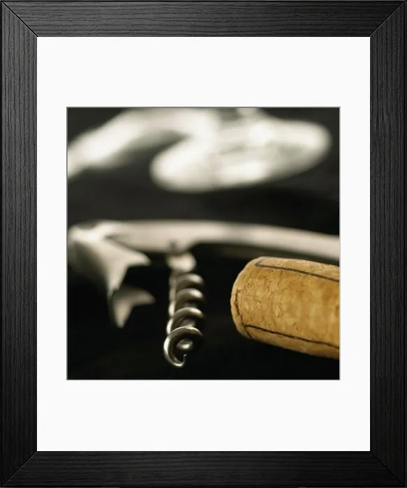 Framed Print : Close-up of a cork with a corkscrew Framed Print : Close-up of a cork with a corkscrew