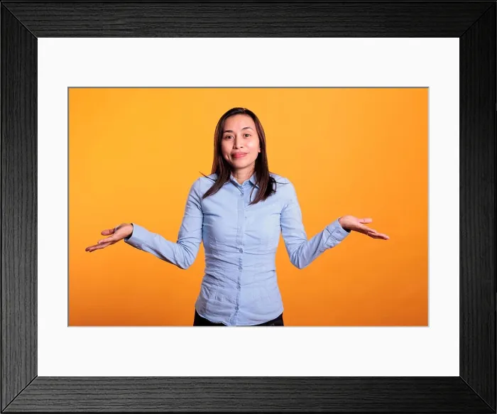 Framed Print : Confused asian woman being hesitant and unconfident Framed Print : Confused asian woman being hesitant and unconfident
