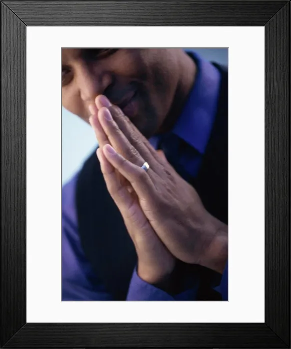 Framed Print : Close-up of a businessman praying Framed Print : Close-up of a businessman praying