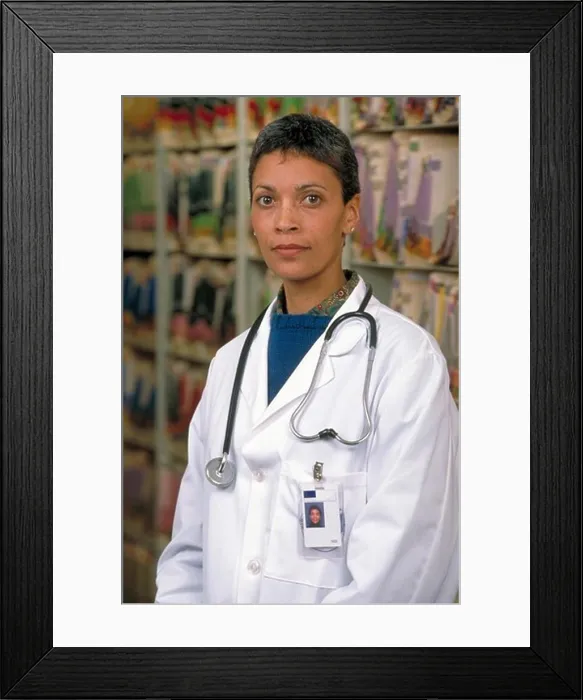 Framed Print : Portrait of a Serious Female Doctor