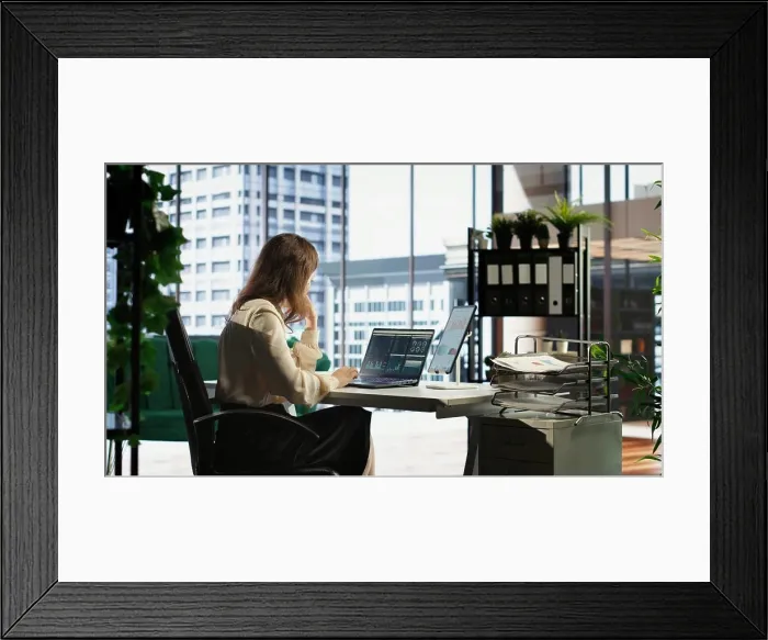 Framed Print : Woman in a powerful executive role oversees budget analysis for investment strategy Framed Print : Woman in a powerful executive role oversees budget analysis for investment strategy