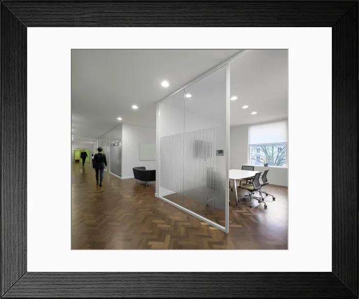 Framed Print : Meeting rooms enclosed behind a glass wall. AxiCom Office, London, United Kingdom. Architect: MZC+, 2019 Framed Print : Meeting rooms enclosed behind a glass wall. AxiCom Office, London, United Kingdom. Architect: MZC+, 2019