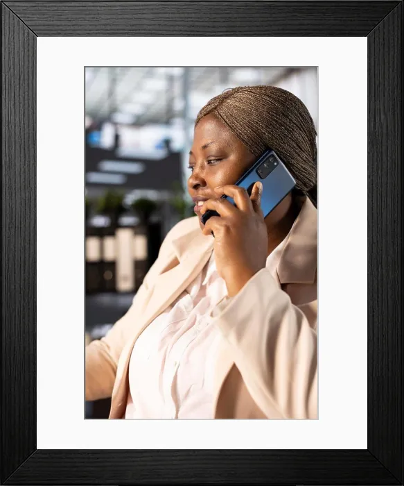 Framed Print : Businesswoman in telephone call with shareholders Framed Print : Businesswoman in telephone call with shareholders