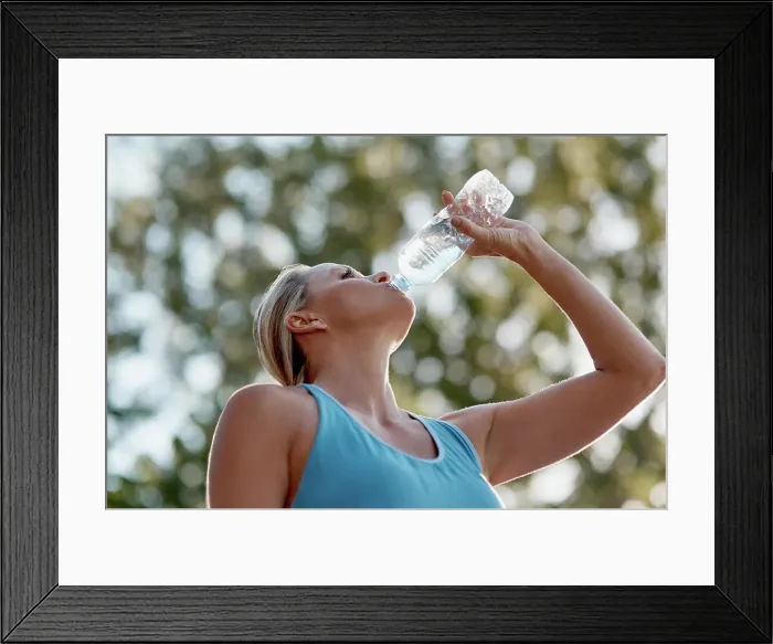 Framed Print : Fitness, mature woman and drinking water in outdoor from exercise Framed Print : Fitness, mature woman and drinking water in outdoor from exercise