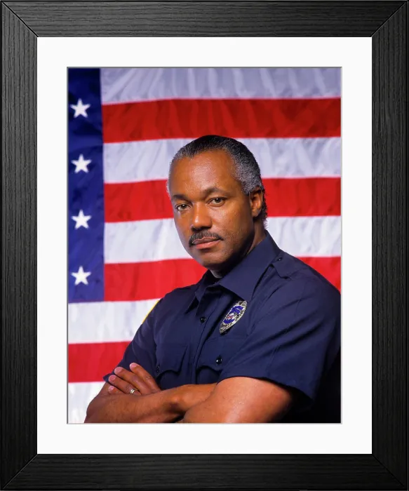 Framed Print : 1990s BLACK POLICEMAN LOOKING AT CAMERA STANDING IN FRONT OF U.S. FLAG Framed Print : 1990s BLACK POLICEMAN LOOKING AT CAMERA STANDING IN FRONT OF U.S. FLAG