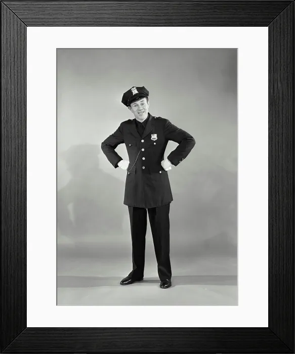 Framed Print : Vintage photograph. Full length portrait of policeman with hands on hips Framed Print : Vintage photograph. Full length portrait of policeman with hands on hips