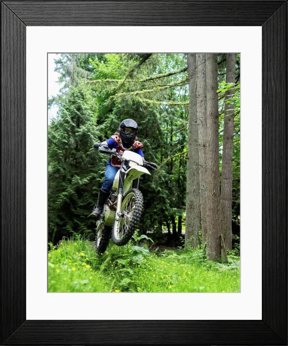 Framed Print : A teenage boy riding a motorbike, taking a jump in mid-air; Bothell, Washington, United States of America Framed Print : A teenage boy riding a motorbike, taking a jump in mid-air; Bothell, Washington, United States of America