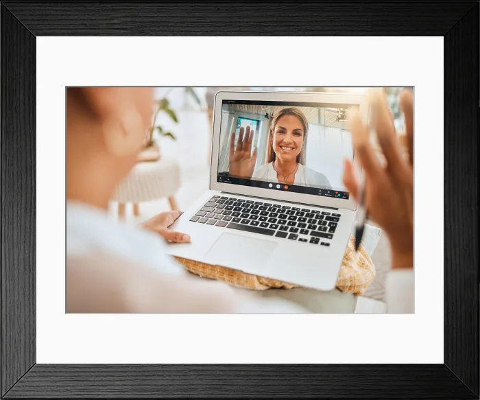 Framed Print : Laptop, video call and mental health with wave hello in virtual counseling consultation Framed Print : Laptop, video call and mental health with wave hello in virtual counseling consultation