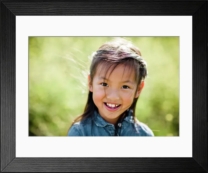 Framed Print : Portrait of Seven Year Old Asian Girl in Field in San Diego Framed Print : Portrait of Seven Year Old Asian Girl in Field in San Diego