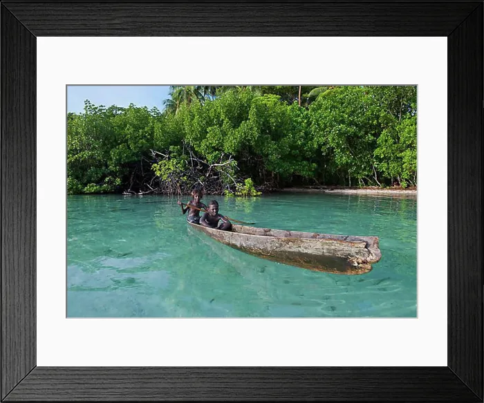 Framed Print : Local boys in a canoe in the Marovo Lagoon, Marovo Lagoon, Western Province, Solomon Islands, Oceania