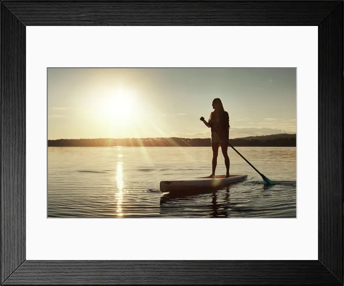 Framed Print : Lake, sunset and woman on paddle board for relax