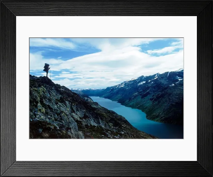 Framed Print : Hiker standing above Gjende (or Gjendin) Lake in the Jotunheimen mountains in Norway's Jotunheimen National Park Framed Print : Hiker standing above Gjende (or Gjendin) Lake in the Jotunheimen mountains in Norway's Jotunheimen National Park
